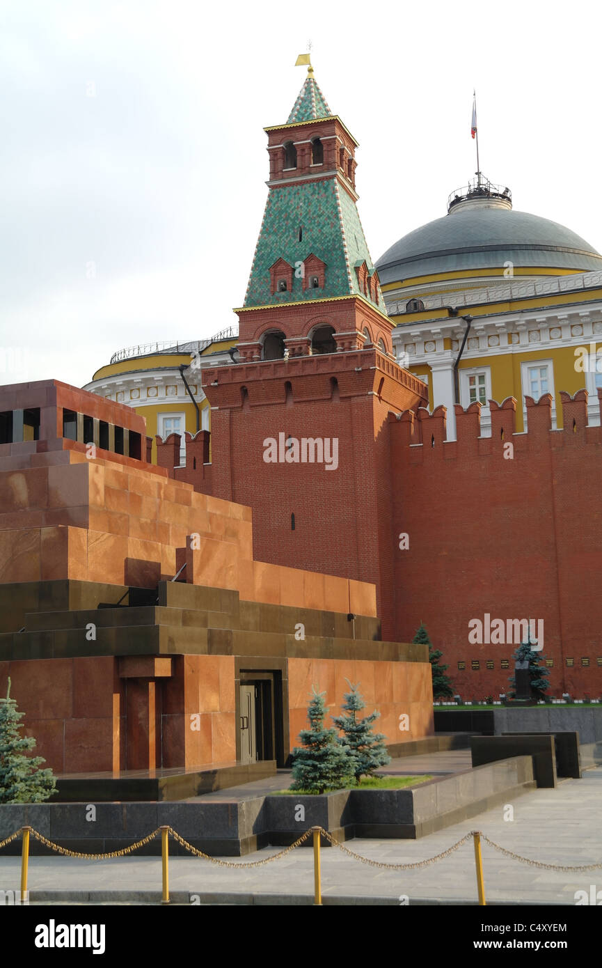 The Senatskaya Tower of the Moscow Kremlin. Near: Lenin's Mausoleum (on the front), the Kremlin Senate (on the back) Stock Photo