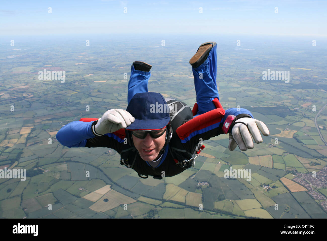 Closeup of skydiver in free-fall Stock Photo