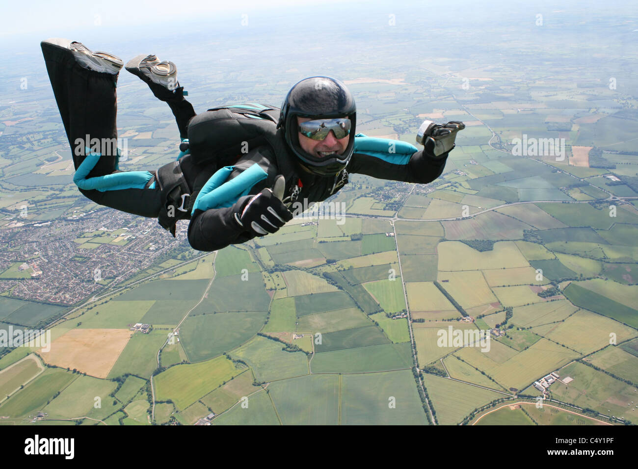 Close-up of skydiver in free-fall Stock Photo