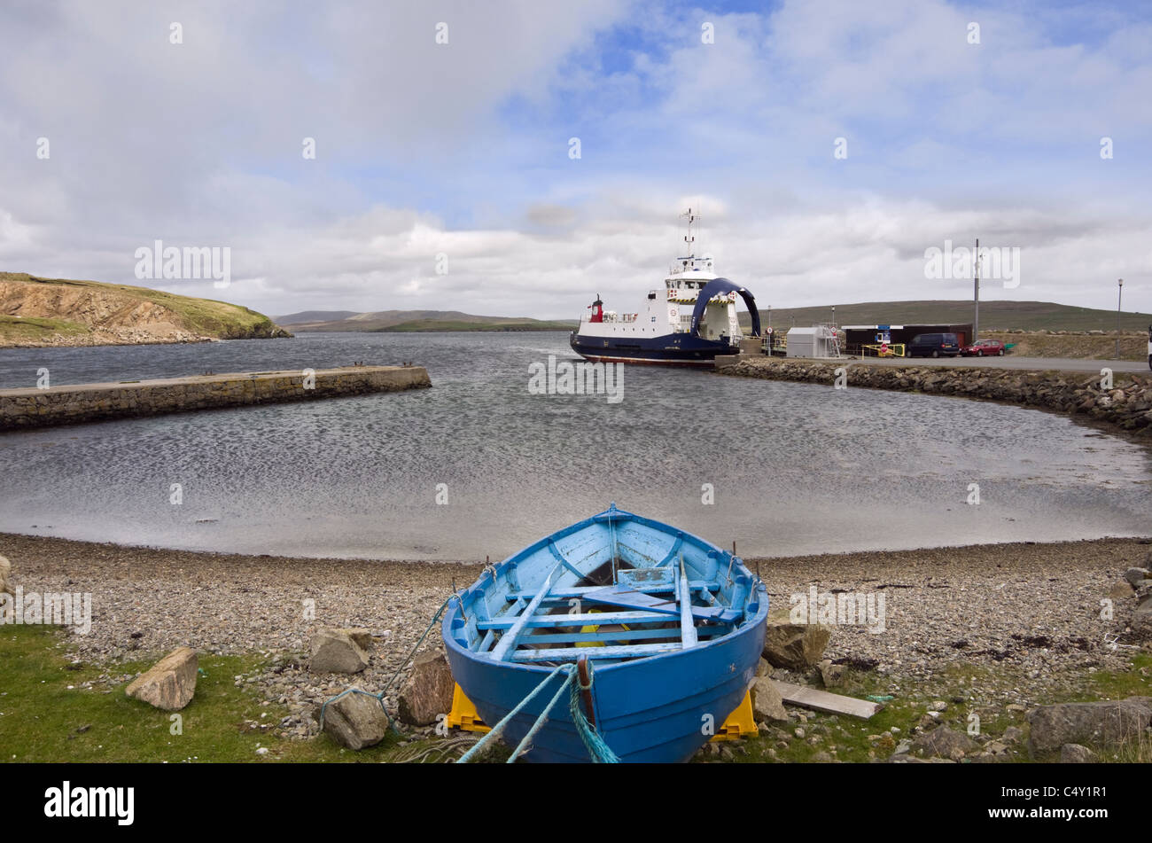 Unst and Fetlar ferry port with boat docked at the terminal in Bluemull Sound. Gutcher, Yell, Shetland Islands, Scotland, UK Stock Photo