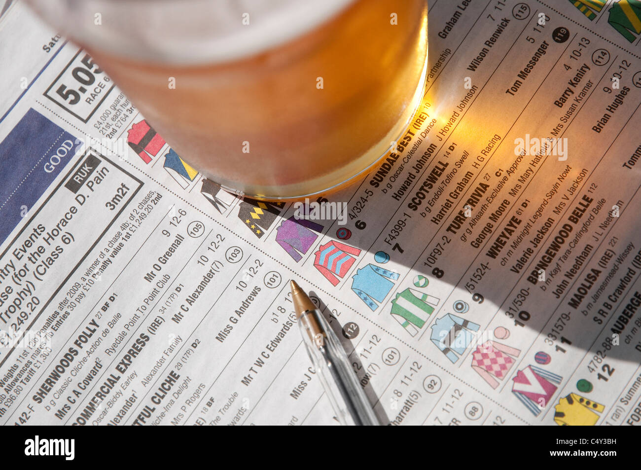 horse racing post newspaper and pint of beer Stock Photo