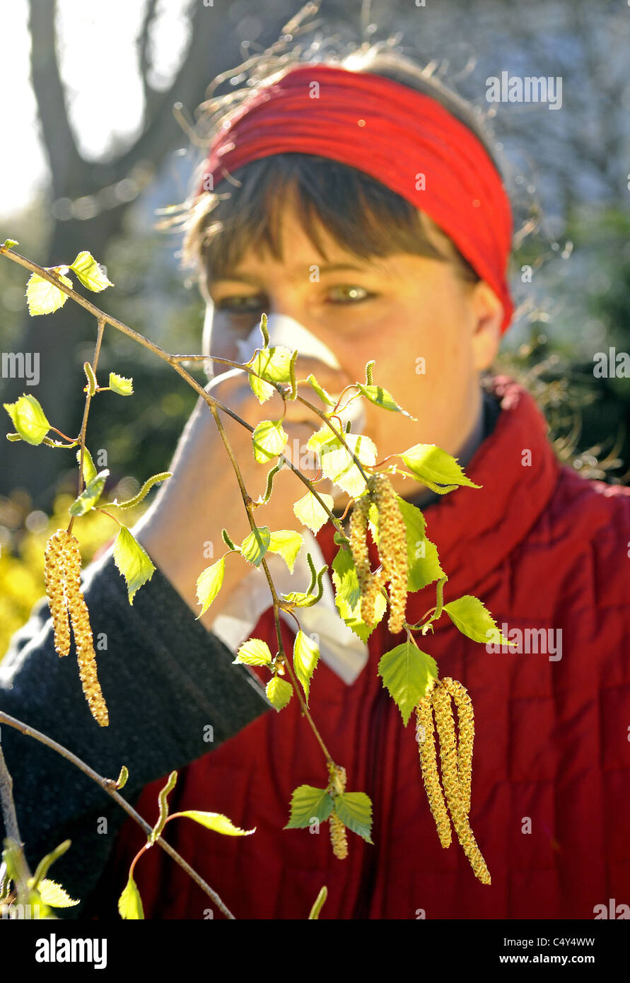 women sniffs behind pollen Stock Photo