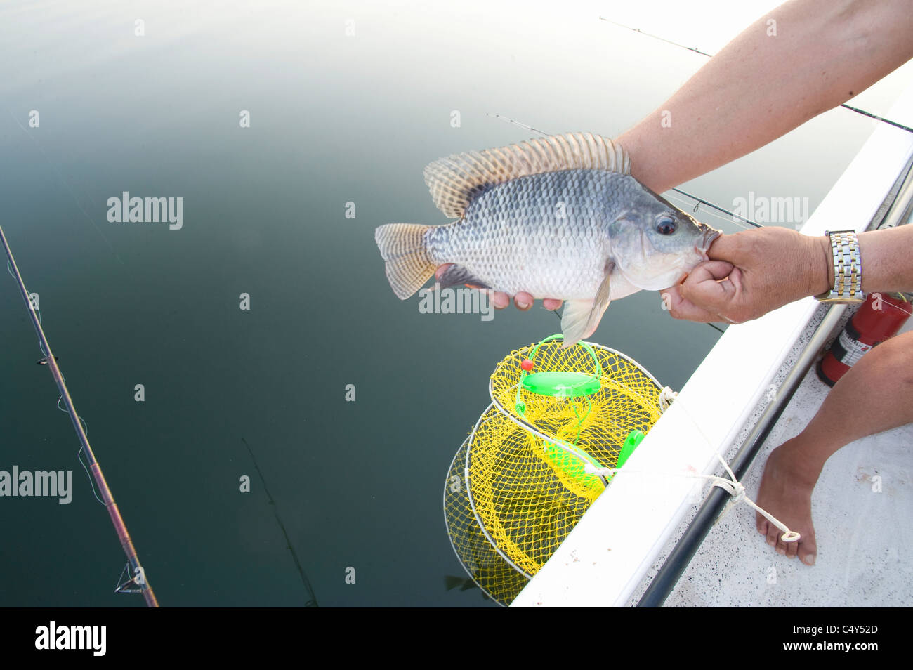 Visitors fish on Zimbabwe's Lake Kariba Stock Photo Alamy