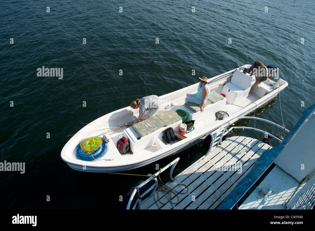 Visitors fish on Zimbabwe's Lake Kariba Stock Photo Alamy