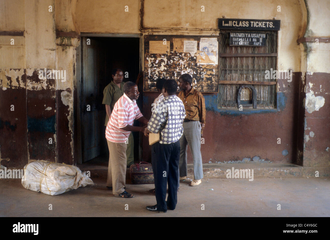 Tanzania ticket office and workers at kigoma railway station hi-res