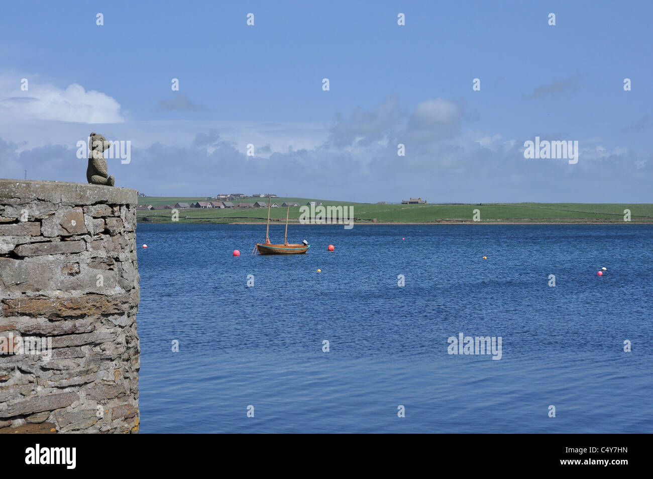 Stromness harbour and teddy bear on the wall, Orkney, Scotland. Stock Photo