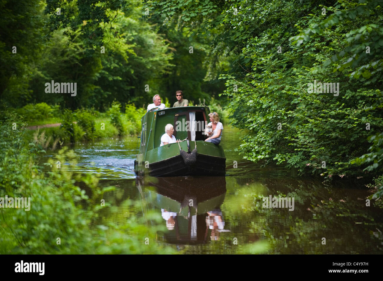 Small narrowboat on canal near Brecon Powys South Wales UK Stock Photo