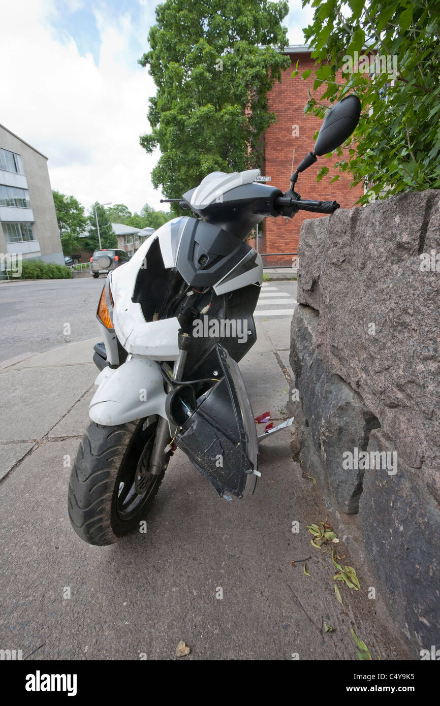 damaged moped after traffic accident Stock Photo