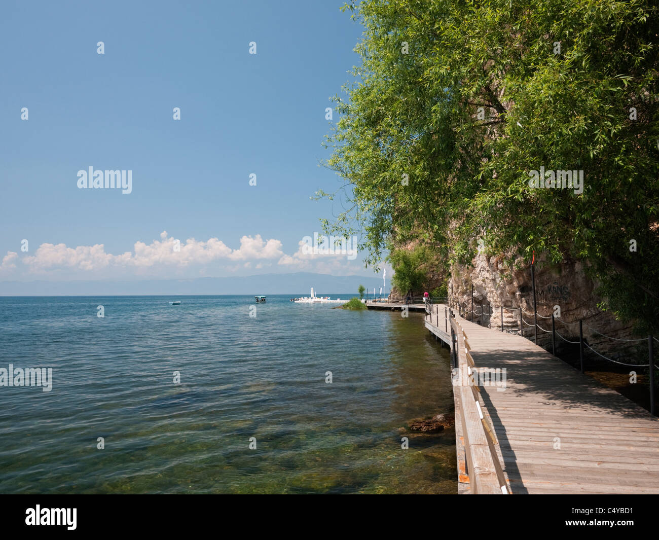 A boardwalk linking Ohrid with the nearby settlement of Kaneo, providing an enjoyable stroll over the waters of Lake Ohrid. Stock Photo