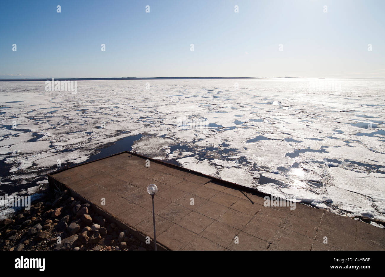 Blocks of melting sea ice float to the shore , Oulu Bothnian Bay , Baltic Sea , Finland Stock Photo