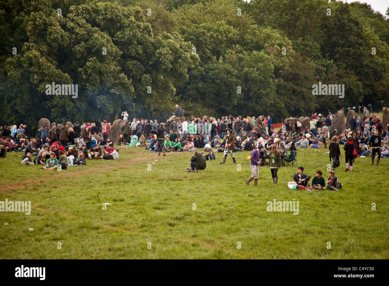 Crowds gathering at the stone circle in Kings Meadow, Glastonbury
