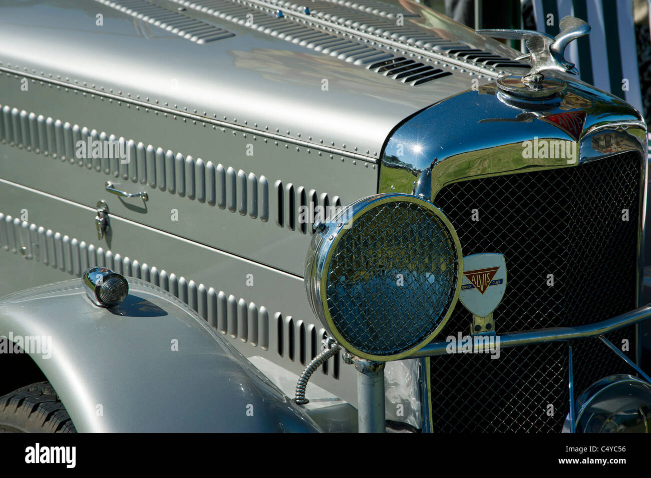 Alvis motor car front head light and hood ornament Stock Photo Alamy