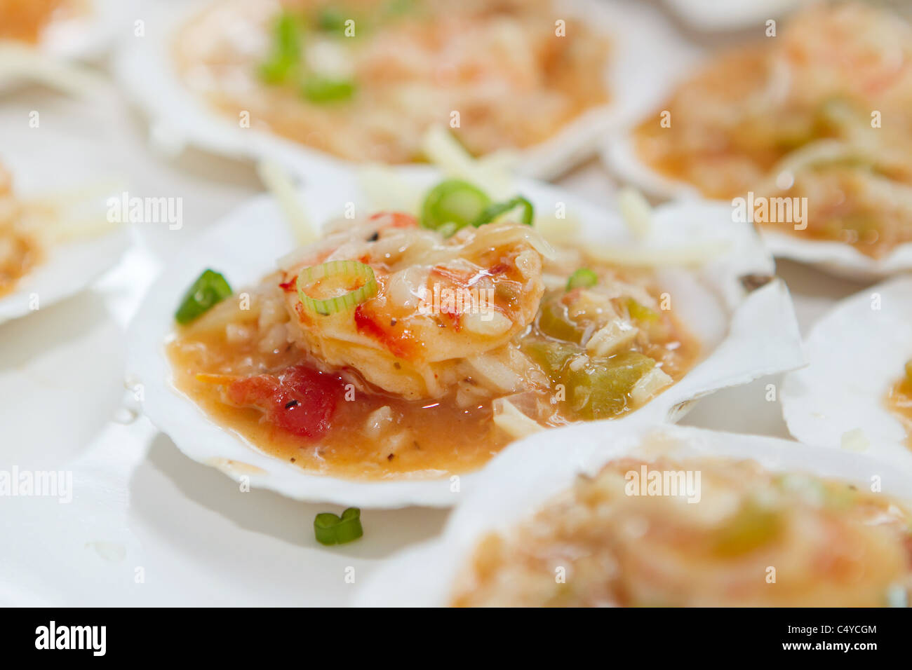 seafood jambalaya with fresh seafood in an oyster shell Stock Photo