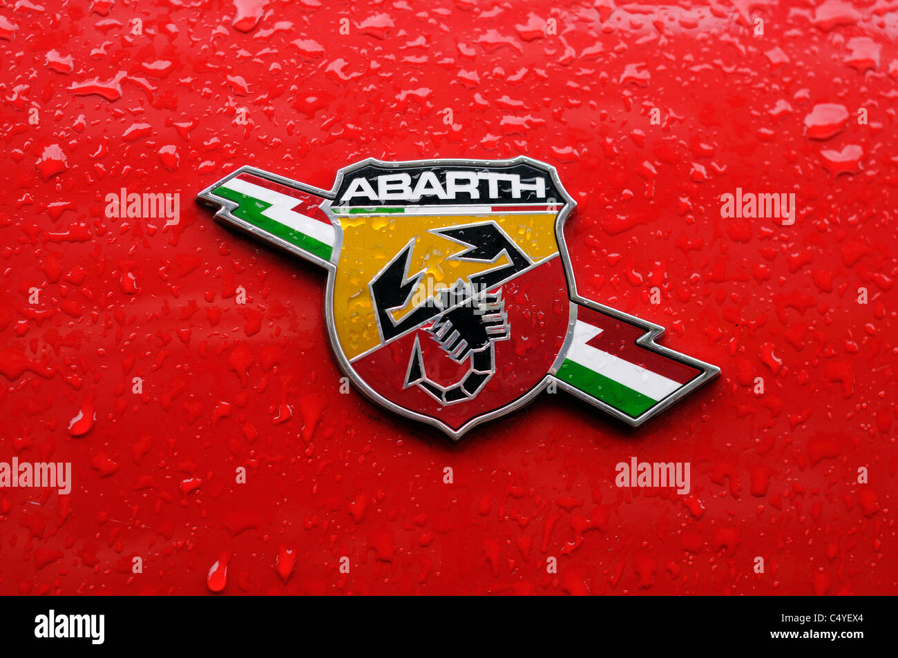 Fiat Abarth Badge On A Red New Fiat 500 Car With Rain Drops Stock Photo Alamy