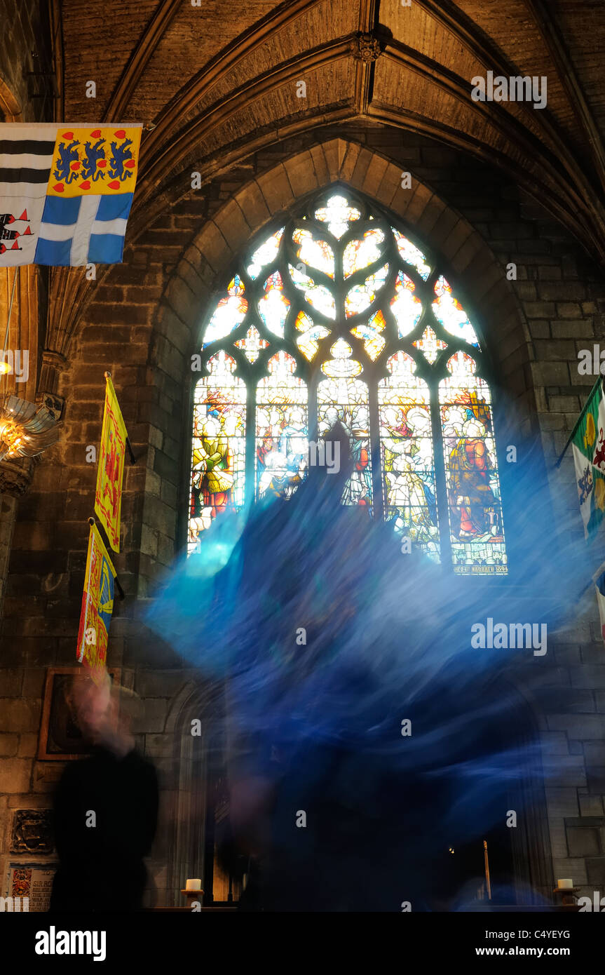 Ghost Style Image In St Giles Cathedral Edinburgh As Someone Walks In Front Of The Camera Stock Photo