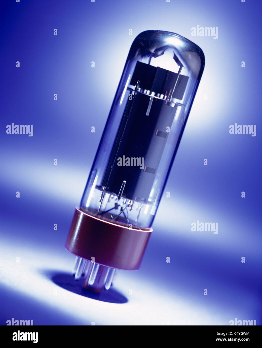 An audio transistor tube on a glowing background Stock Photo