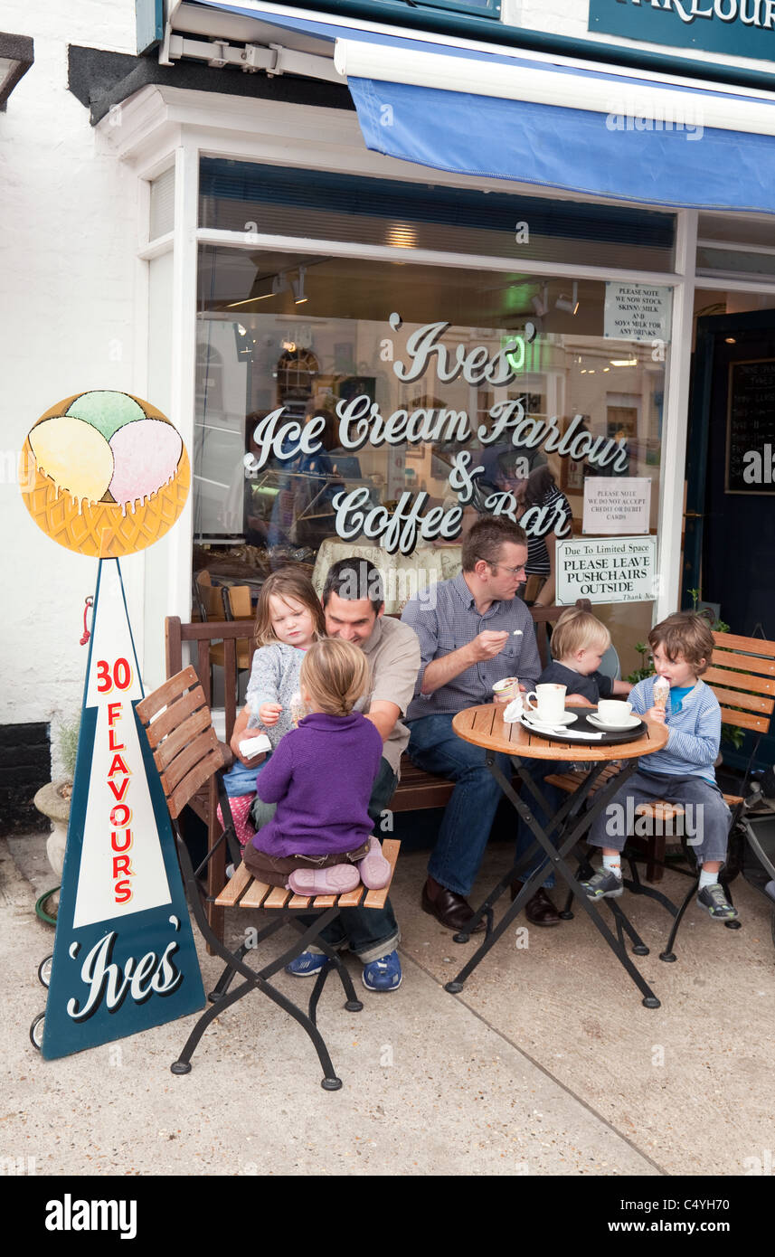 Two fathers and their children having ice cream at the "Ives" Ice Cream