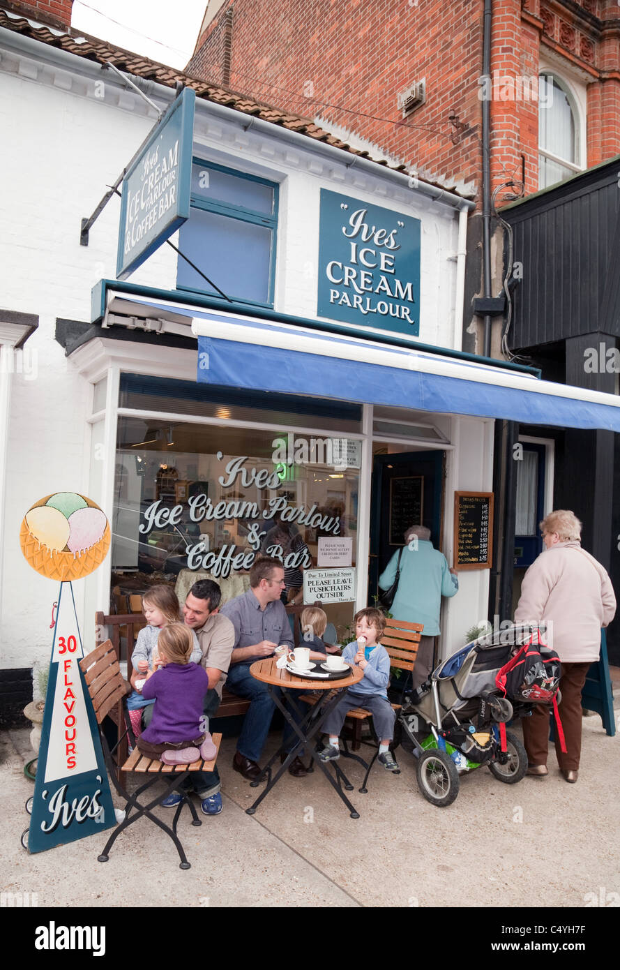 People having ice cream at the 'Ives' Ice Cream parlour, High St, Aldeburgh Suffolk UK Stock Photo