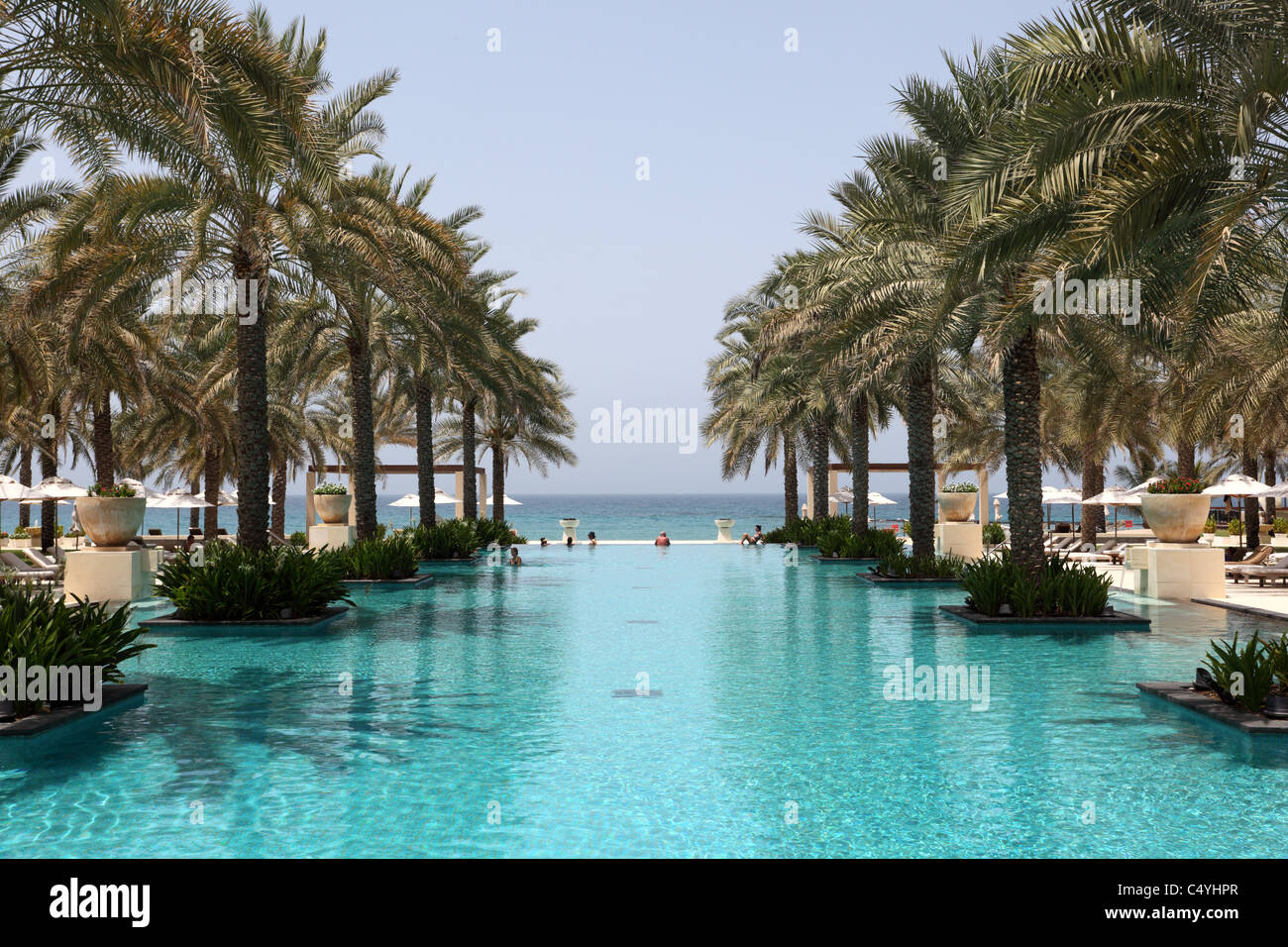 Swimming pool of the Al Bustan hotel in Muscat, Oman Stock Photo