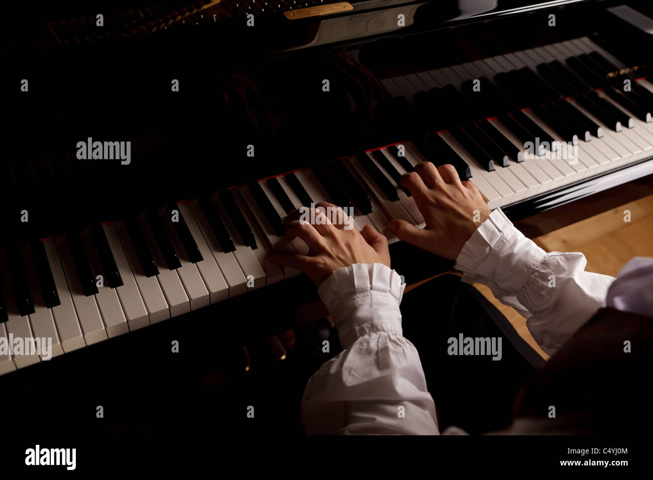 Concert pianist's hands and keyboard Stock Photo