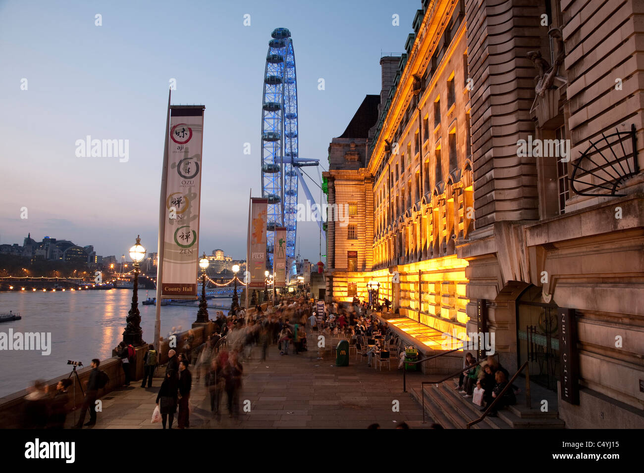 County Hall, London Eye and the South Bank illuminated at night in ...