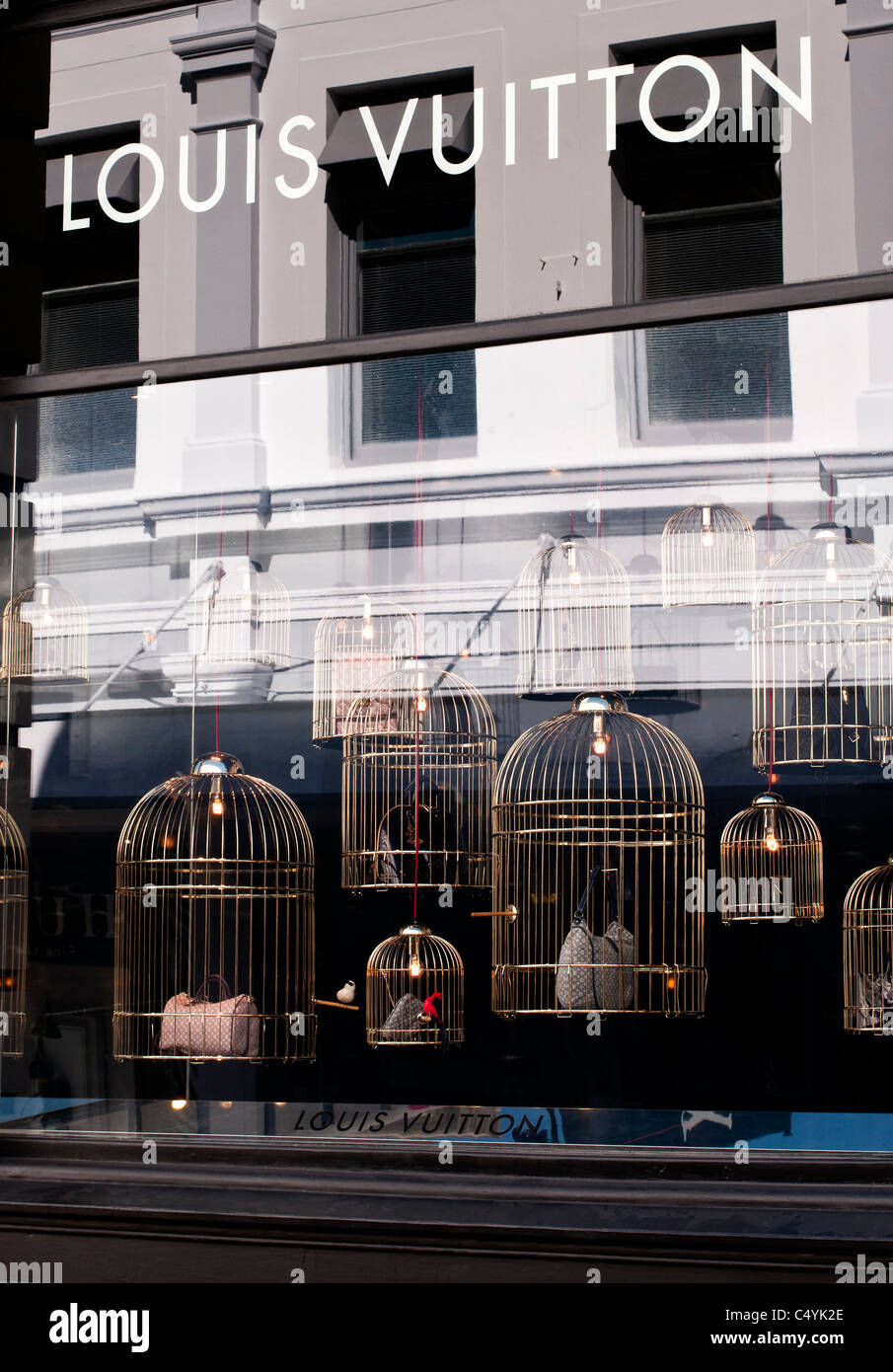 Shop window display of Louis Vuitton bags in gilded cages, King Street, Perth, Western Australia Stock Photo