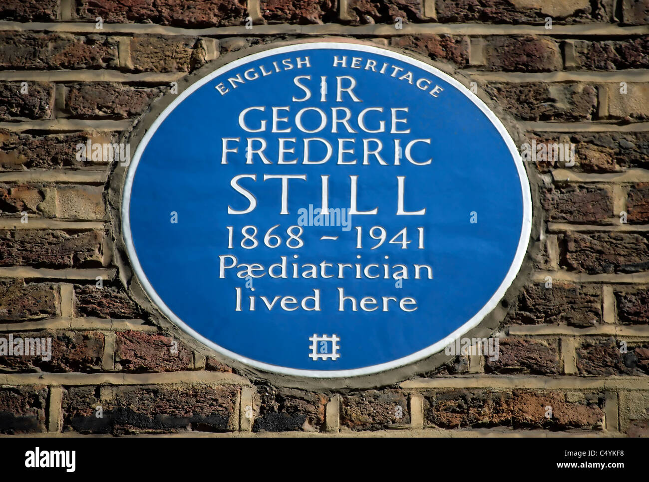 english heritage blue plaque marking a home of paediatrician sir george frederic still, marylebone, london, england Stock Photo