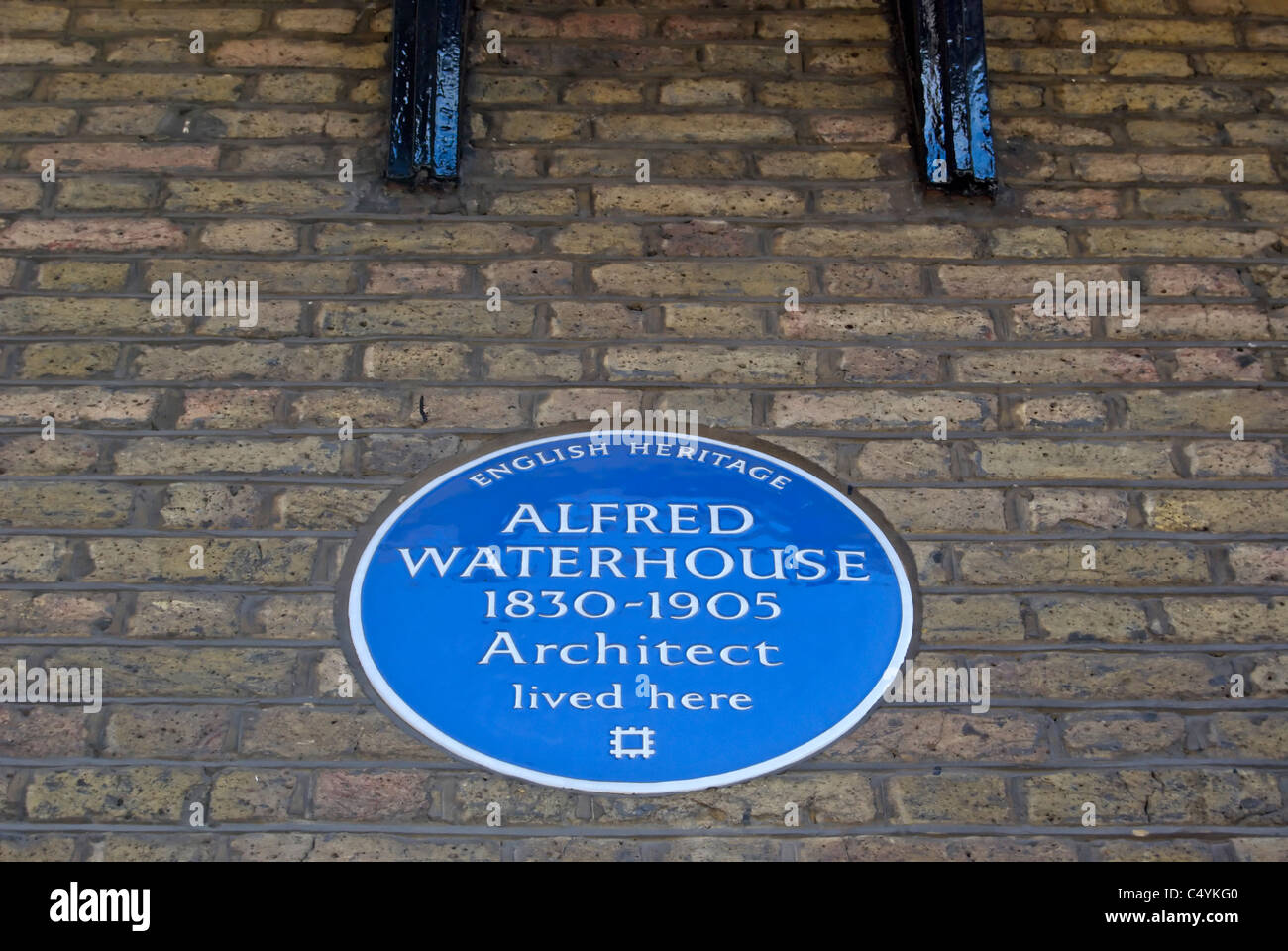 english heritage blue plaque marking a home of architect alfred waterhouse, marylebone, london, england Stock Photo