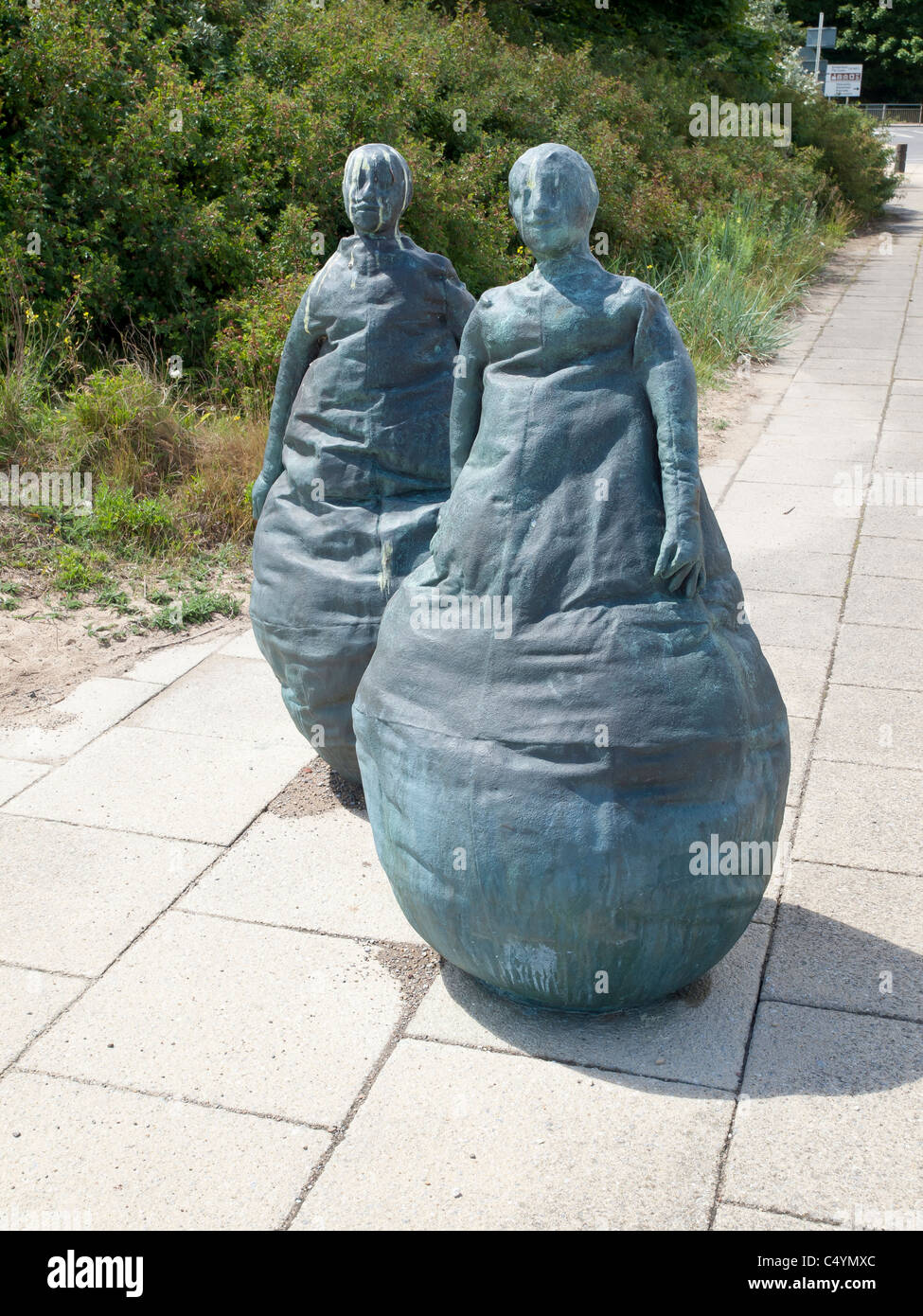 Two of a group of twenty two sculptures called 'Conversation Piece' by Sculptor Juan Muñoz Stock Photo