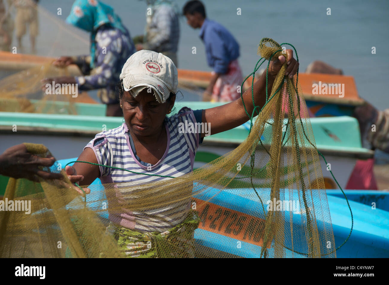 Woman sorting the nets Negombo Sri Lanka Stock Photo