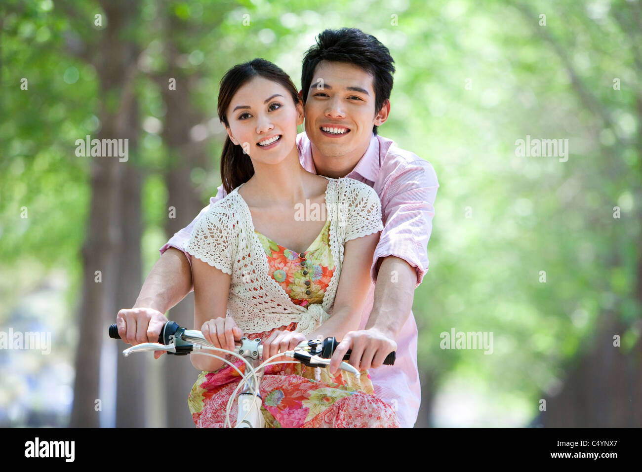 Happy Young Couple at the Park Stock Photo - Alamy