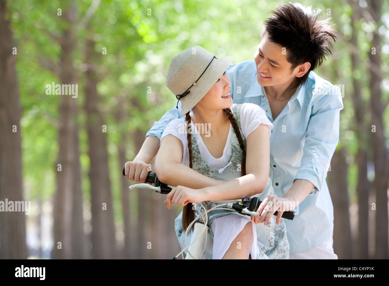 Happy Young Couple at the Park Stock Photo - Alamy