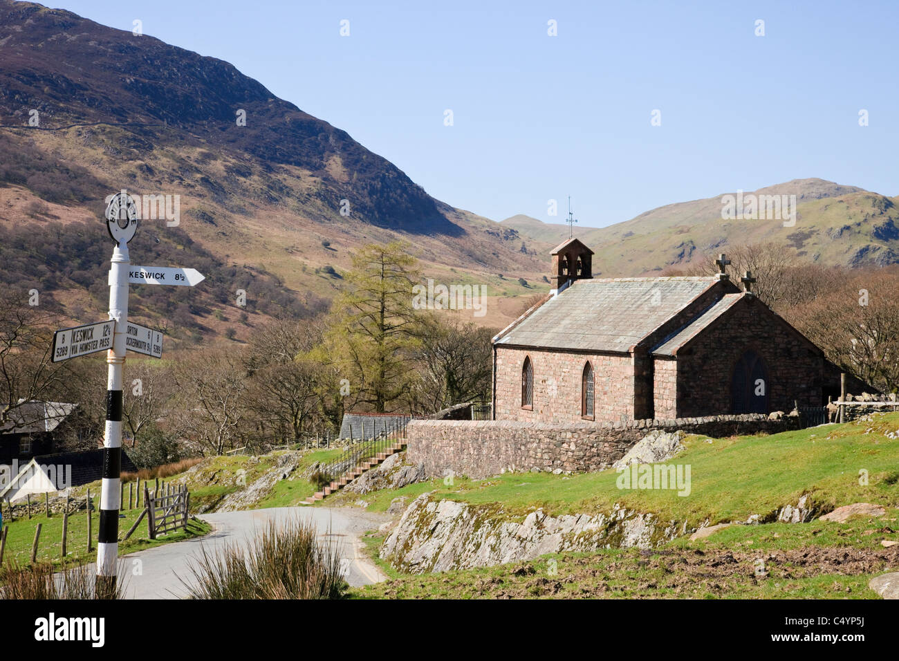 Parish church of St James at crossroads to Newlands Pass in Lake District National Park has Alfred Wainwright memorial. Buttermere Cumbria England UK Stock Photo