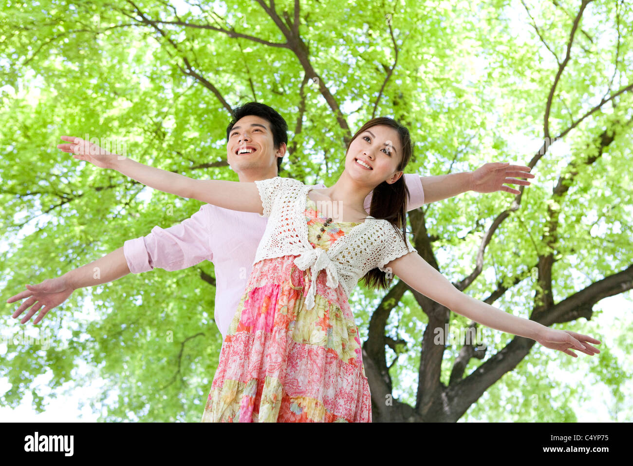 Happy Young Couple at the Park Stock Photo - Alamy