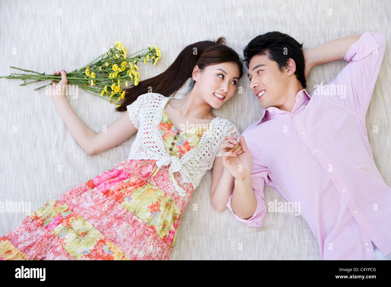 Happy Young Couple at the Park Stock Photo - Alamy