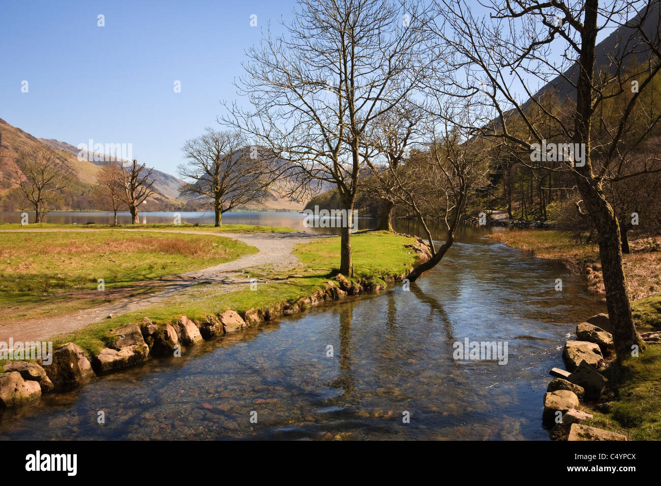 Buttermere, Cumbria, England, UK, Britain. Small beck flowing from Buttermere Lake in the Lake District National Park. Stock Photo