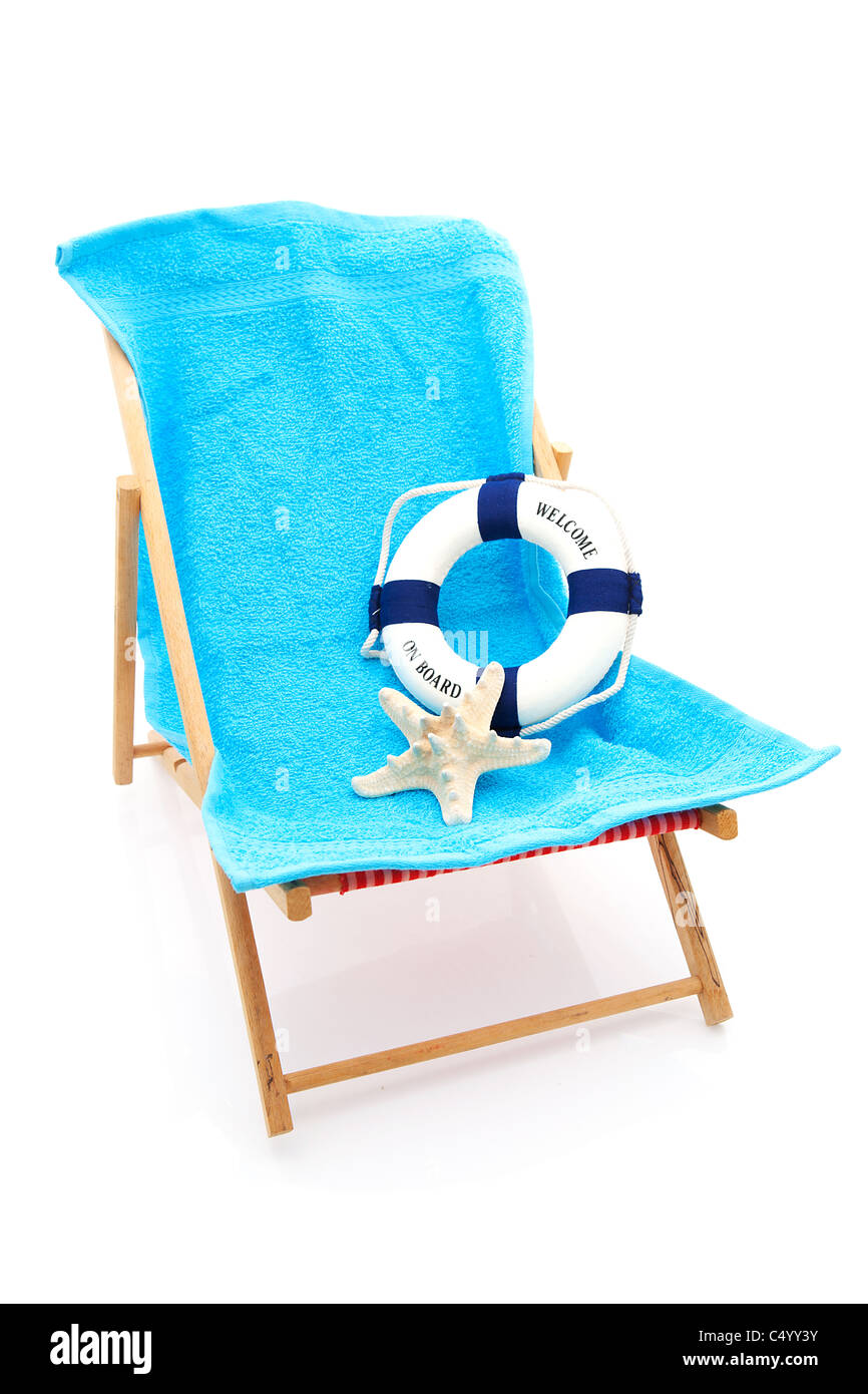 Beach Chair With Blue Towel And Life Buoy Over White Background