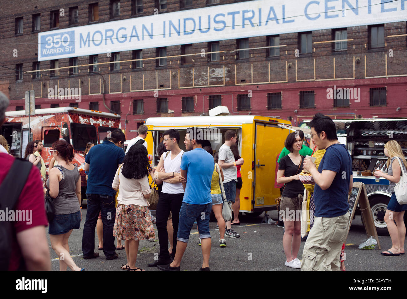 Food trucks park at "Not Yo Mama's Craft Fair" in Jersey City, NJ Stock