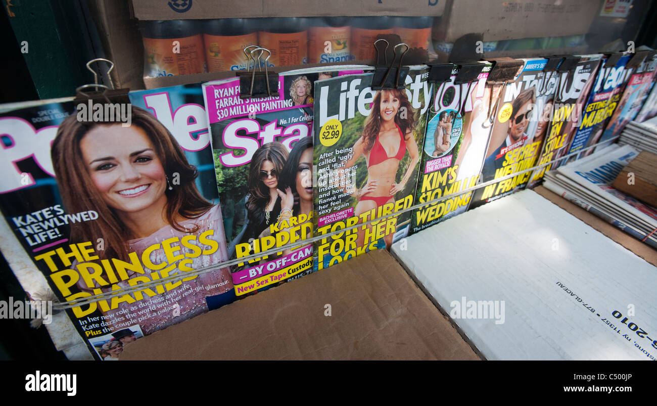 A news stand in New York displays a collection of celebrity tabloid magazines Stock Photo