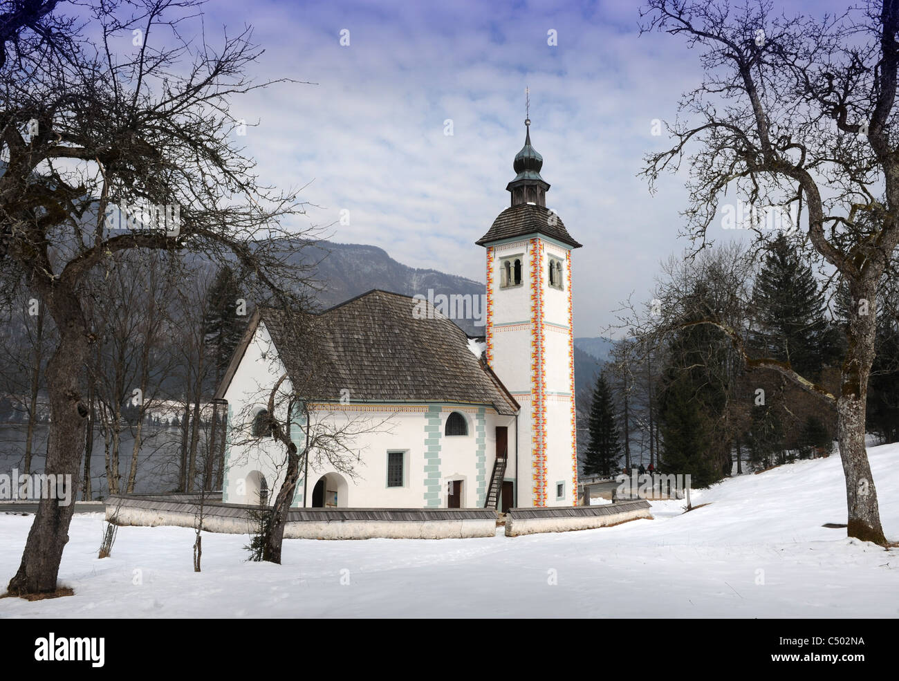 The Church of The Holy Spirit on the southern side of Lake Bohinj in the Triglav National Park of Slovenia Stock Photo