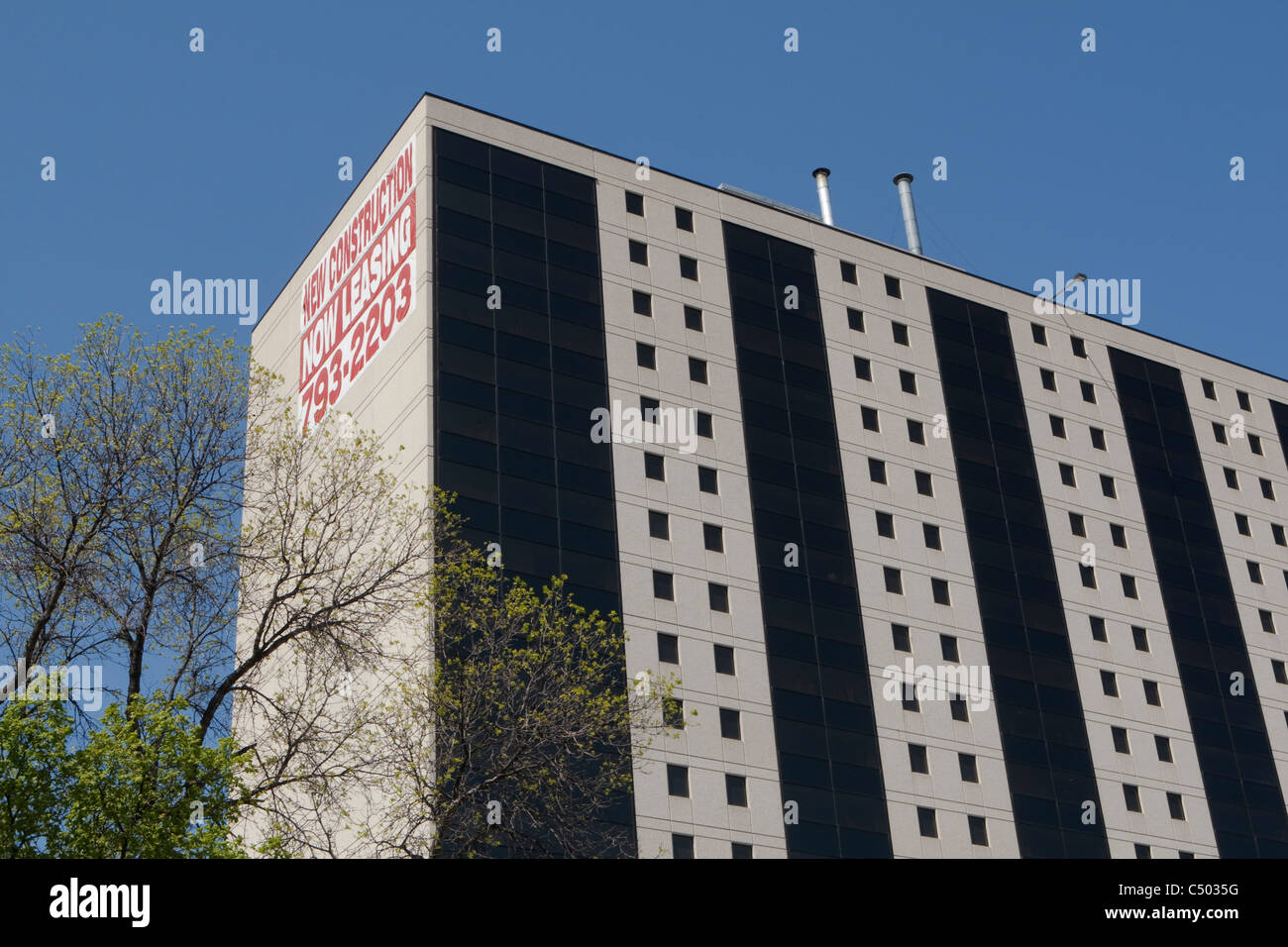 A "For Lease" sign is seen on a residential building in Winnipeg Thursday May 26, 2011. Stock Photo