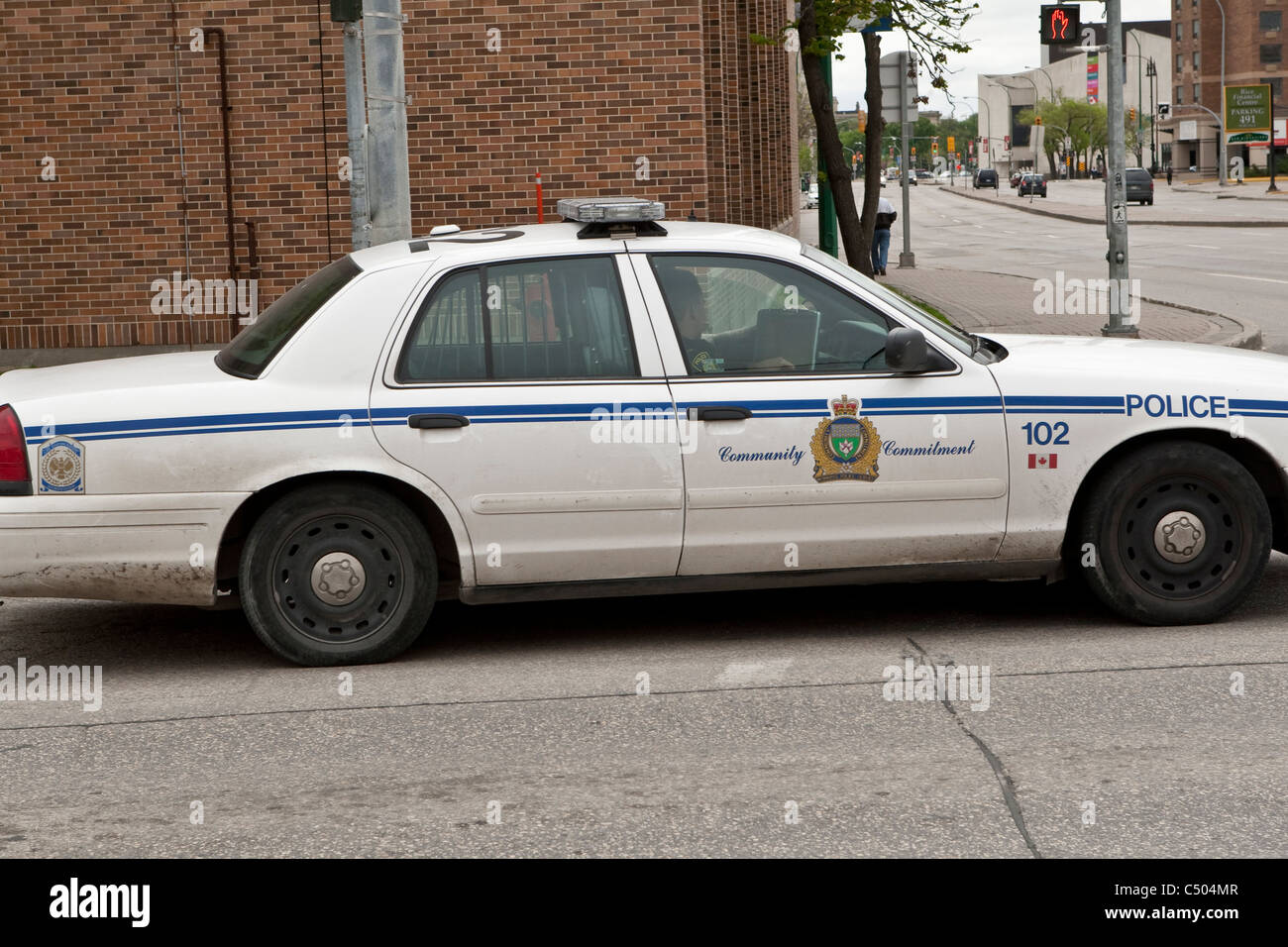 A Winnipeg police car patrols the street in Winnipeg Monday May 23