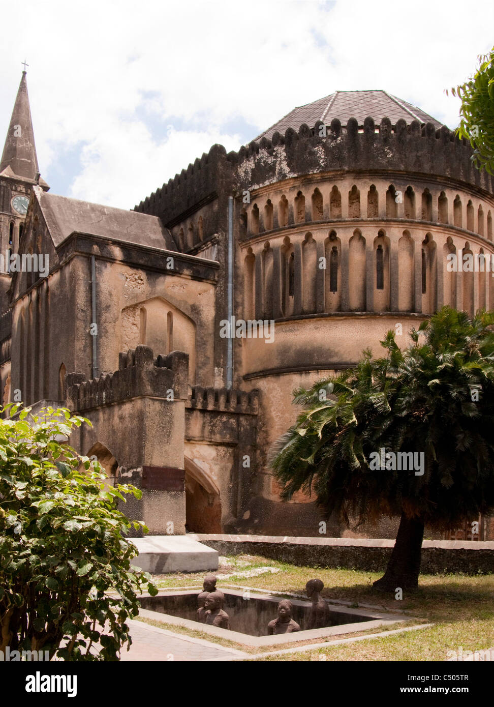 The slave trade memorial with Anglican cathedral behind. Stone town