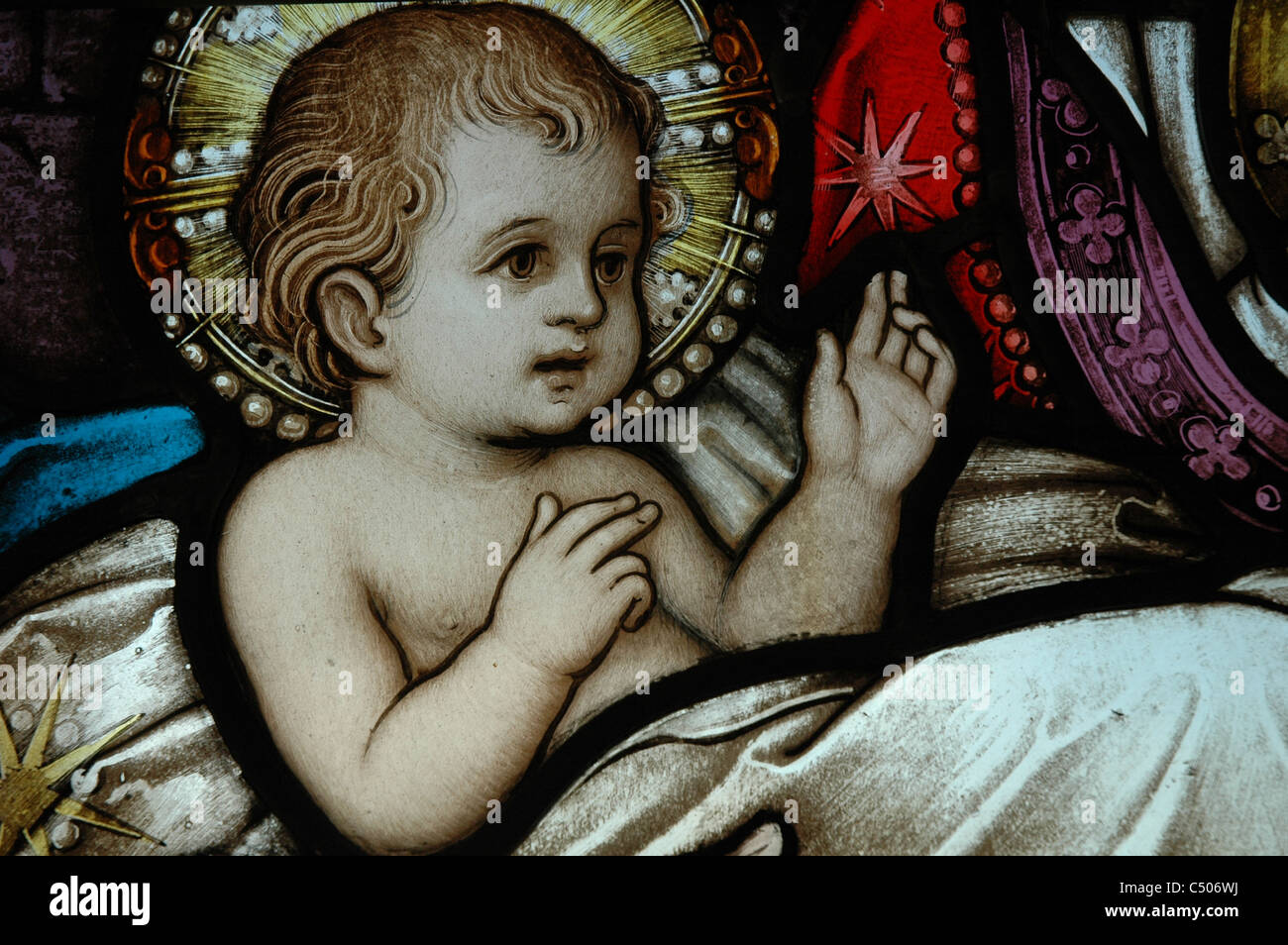Stained glass window depicting Baby Jesus Stock Photo