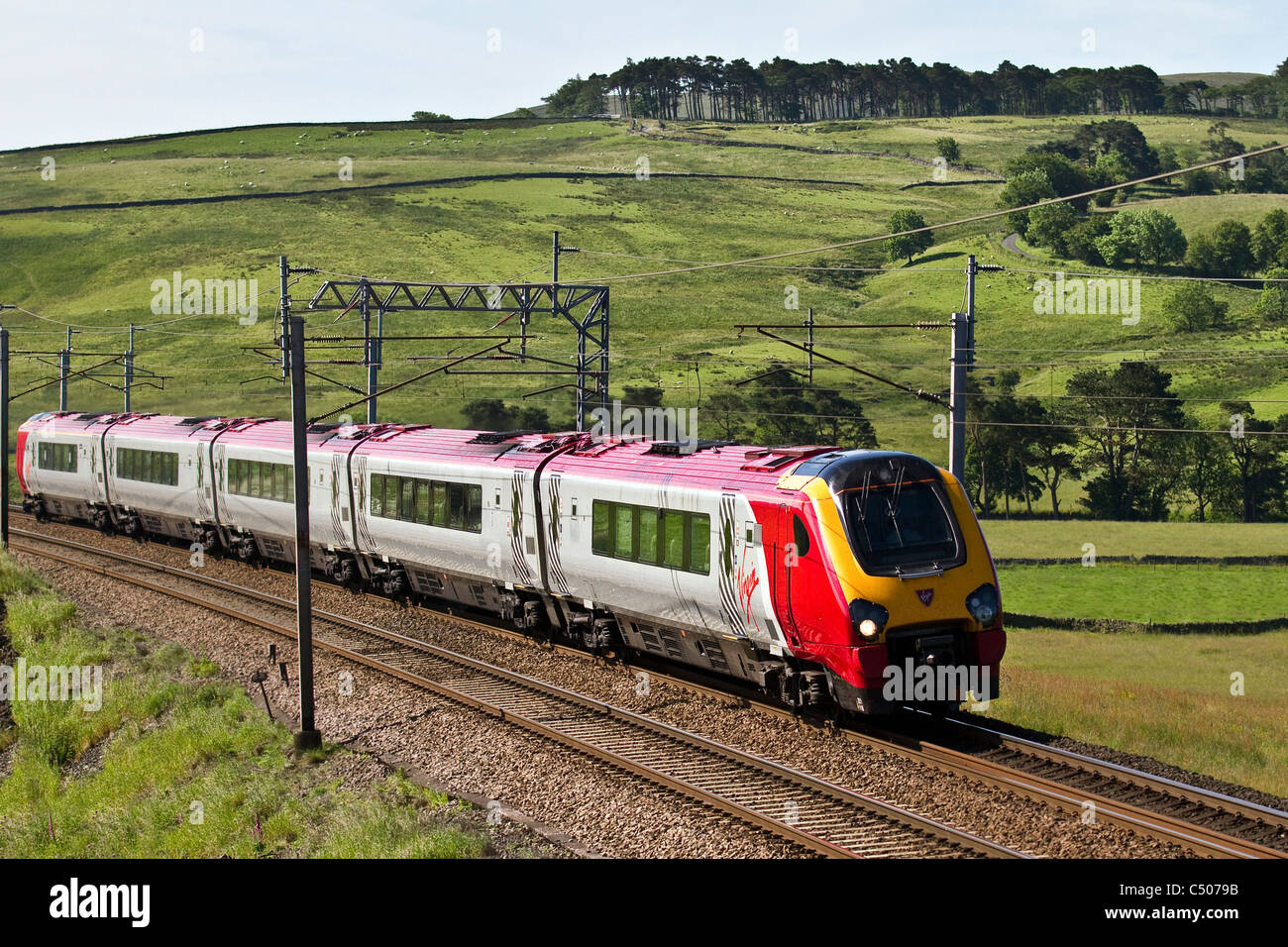 Network Rail British Railways  Electric Virgin Voyager Train at Shap. West Coast Line, Cumbria, UK Stock Photo
