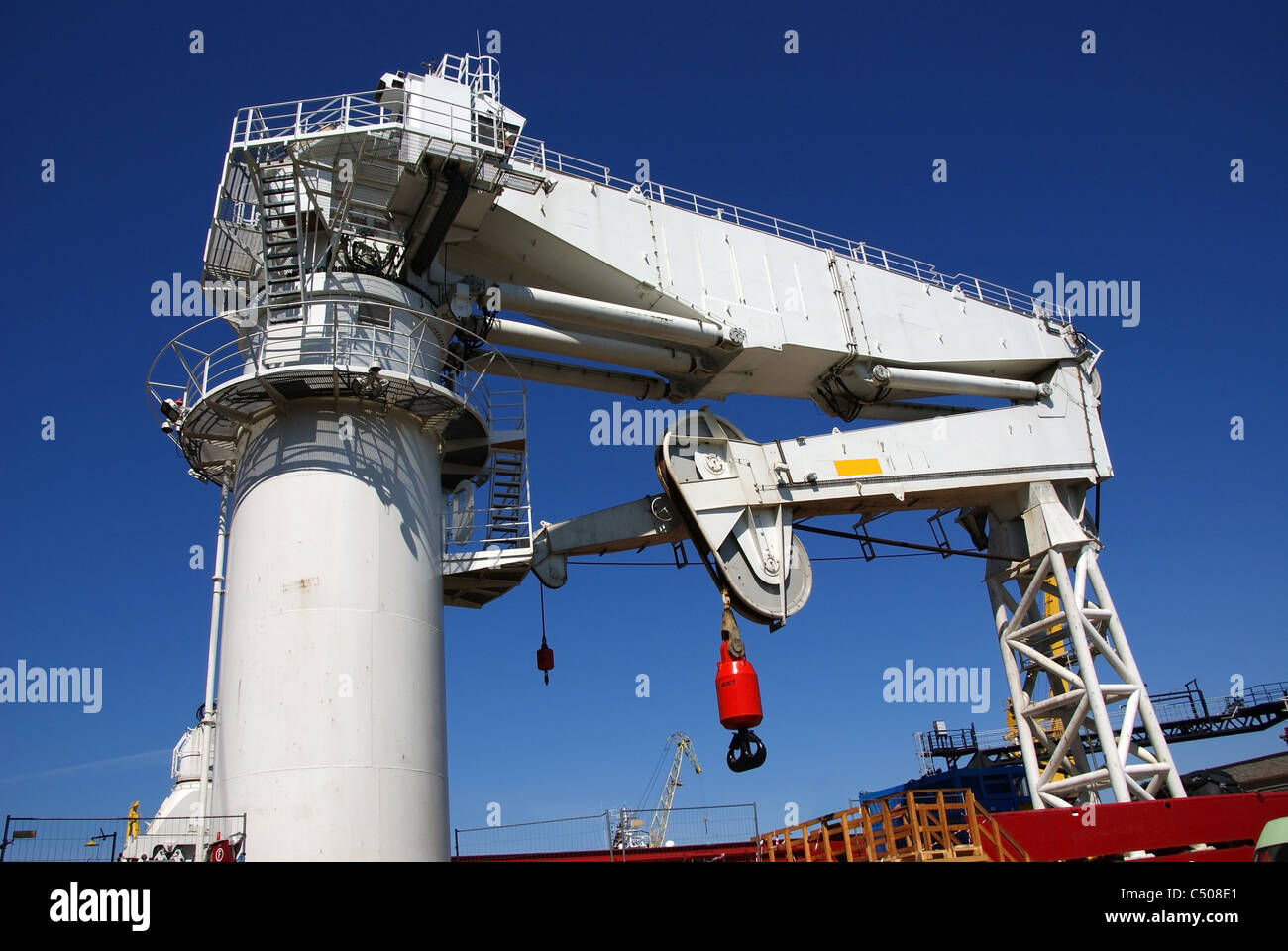 The powerful ship crane is in transport position Stock Photo Alamy