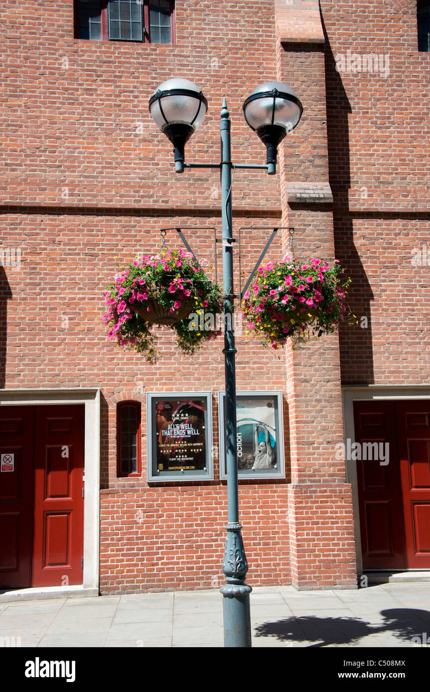 Lamp post with hanging baskets of flowers, London, England, UK Stock