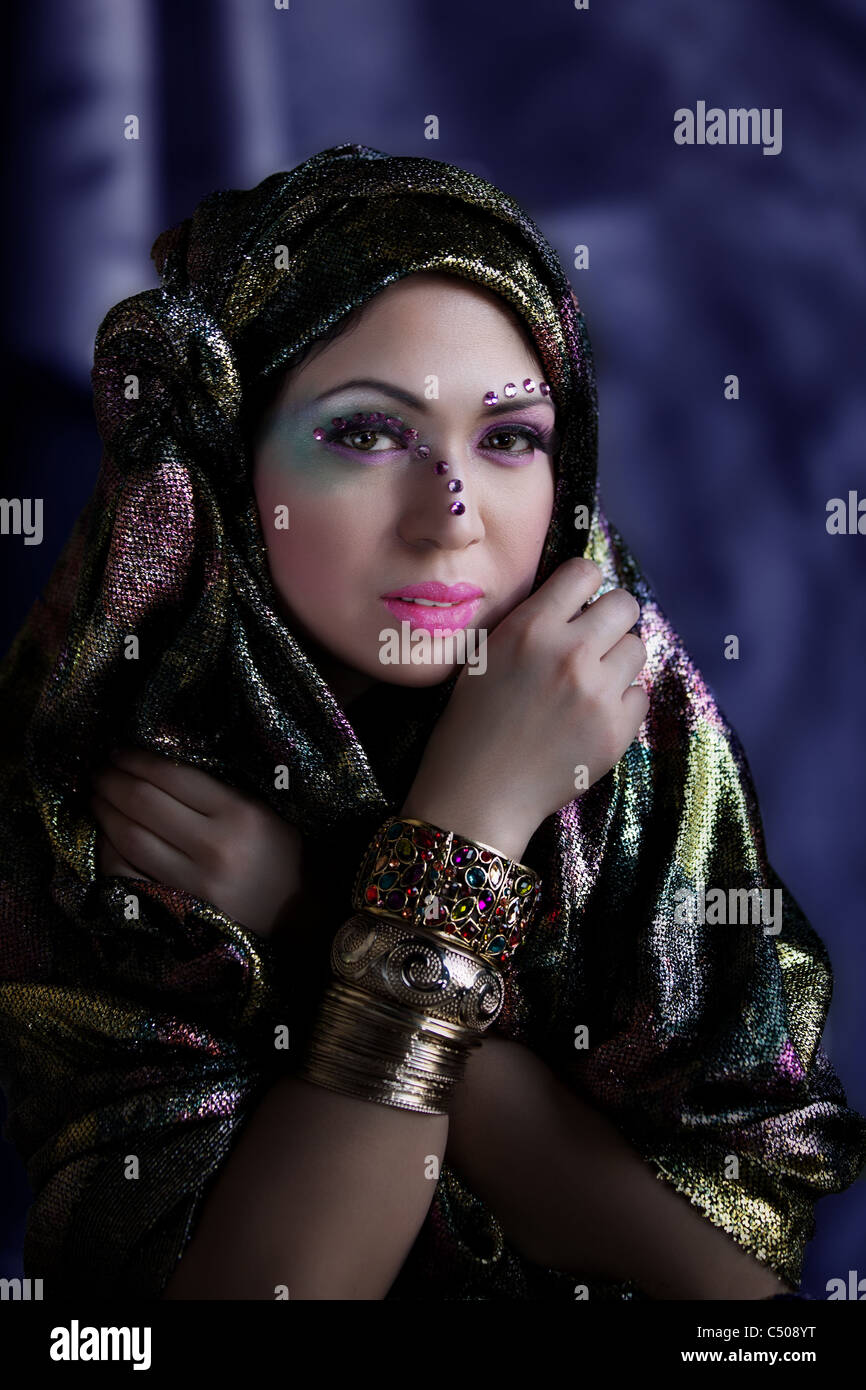 Closeup Portrait of a Beautiful Woman Wearing a Veil with Makeup Stock Photo