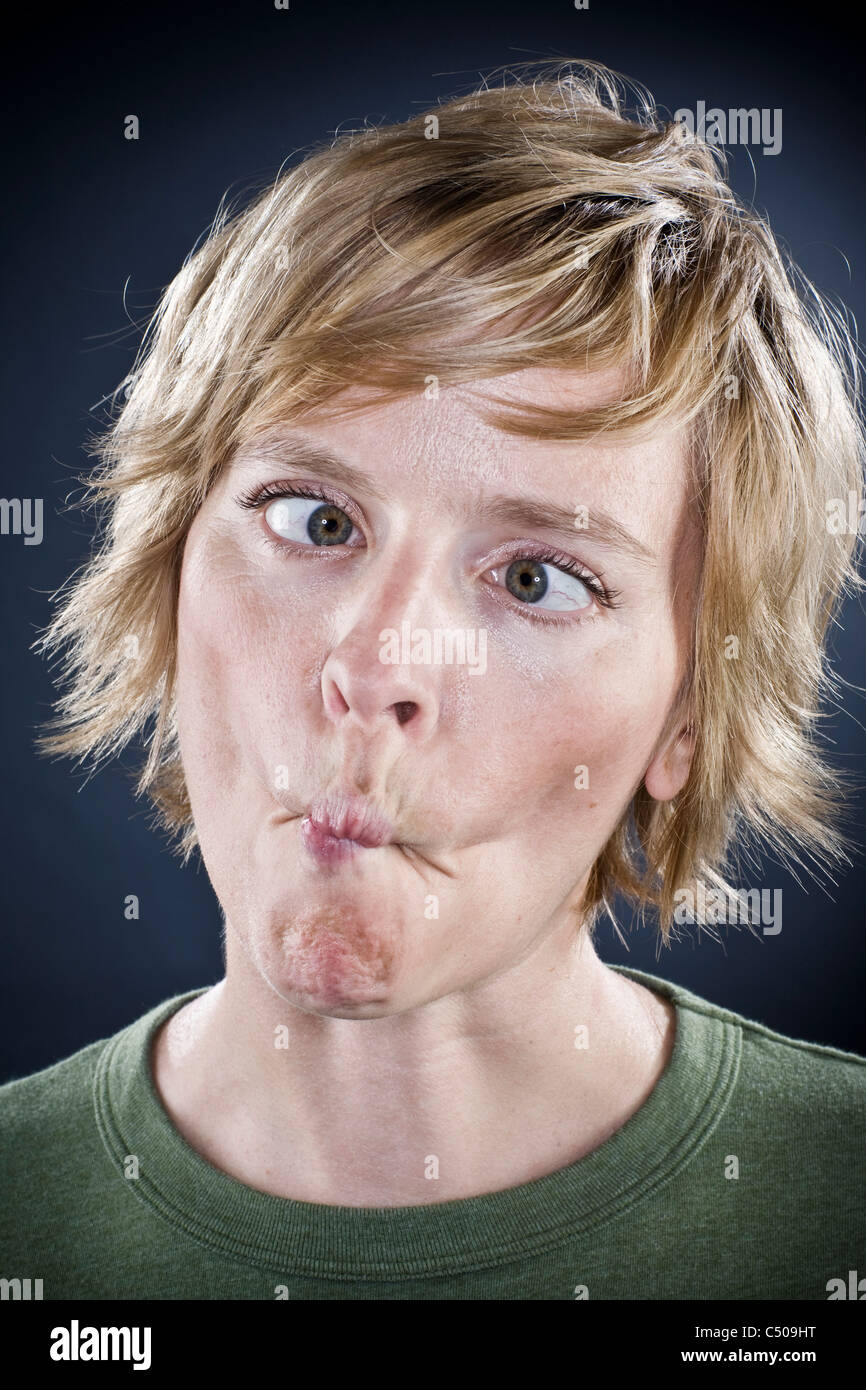 Caucasian woman puckering her mouth Stock Photo Alamy