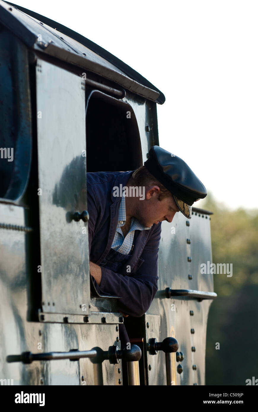 Engine driver in train [Gloucestershire Warwickshire Railway
